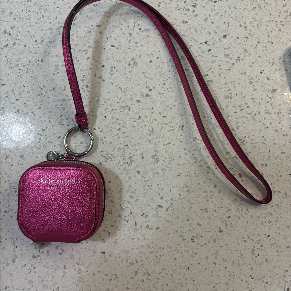 Kate Spade Pink AirPod holder with Strap.